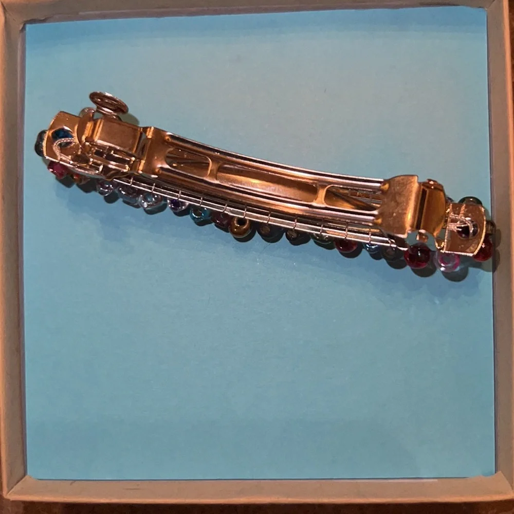 Silver skating necklace, penguin earrings and barrette